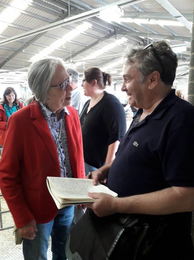 William Booth chats with Mrs Burrough, those husband sells regularly at the sale