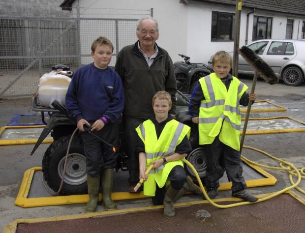 Jim with his grandsons manning the bio-security points in 2007